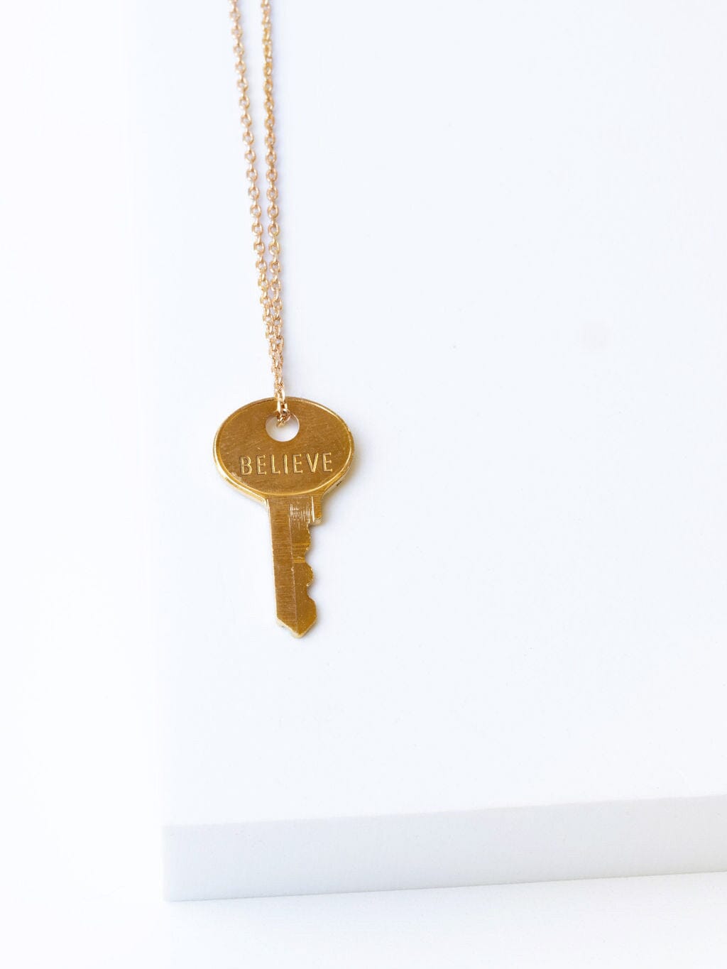 key necklace gold