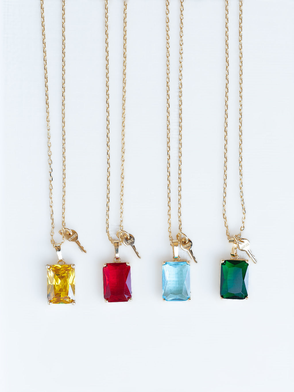 Emerald Cut Gemstone and Mini Key Necklace in Gold