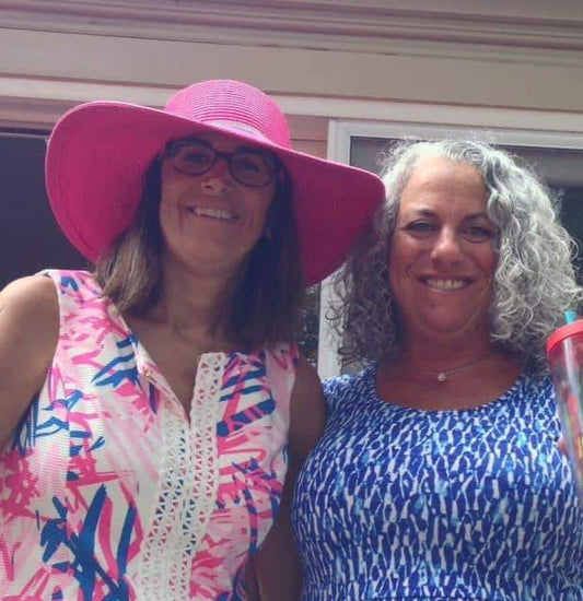 Pink Hat on The Left
