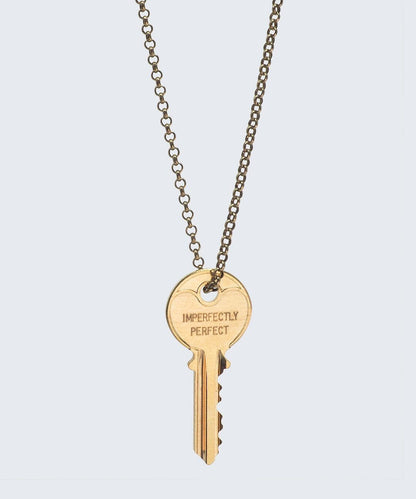 gold/imperfectly perfect