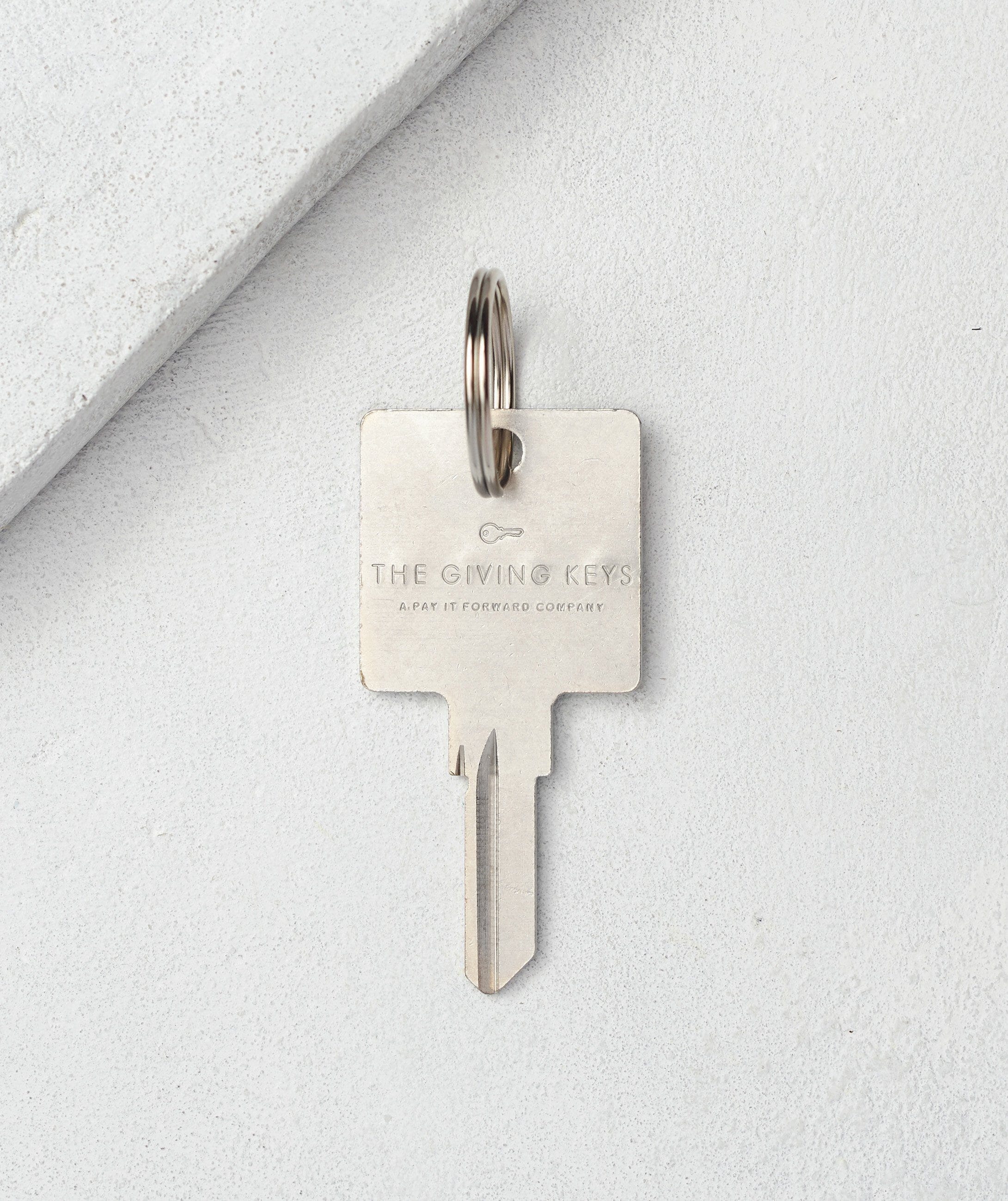 Original Keychain with Custom Hand Engraved Word | The Giving Keys
