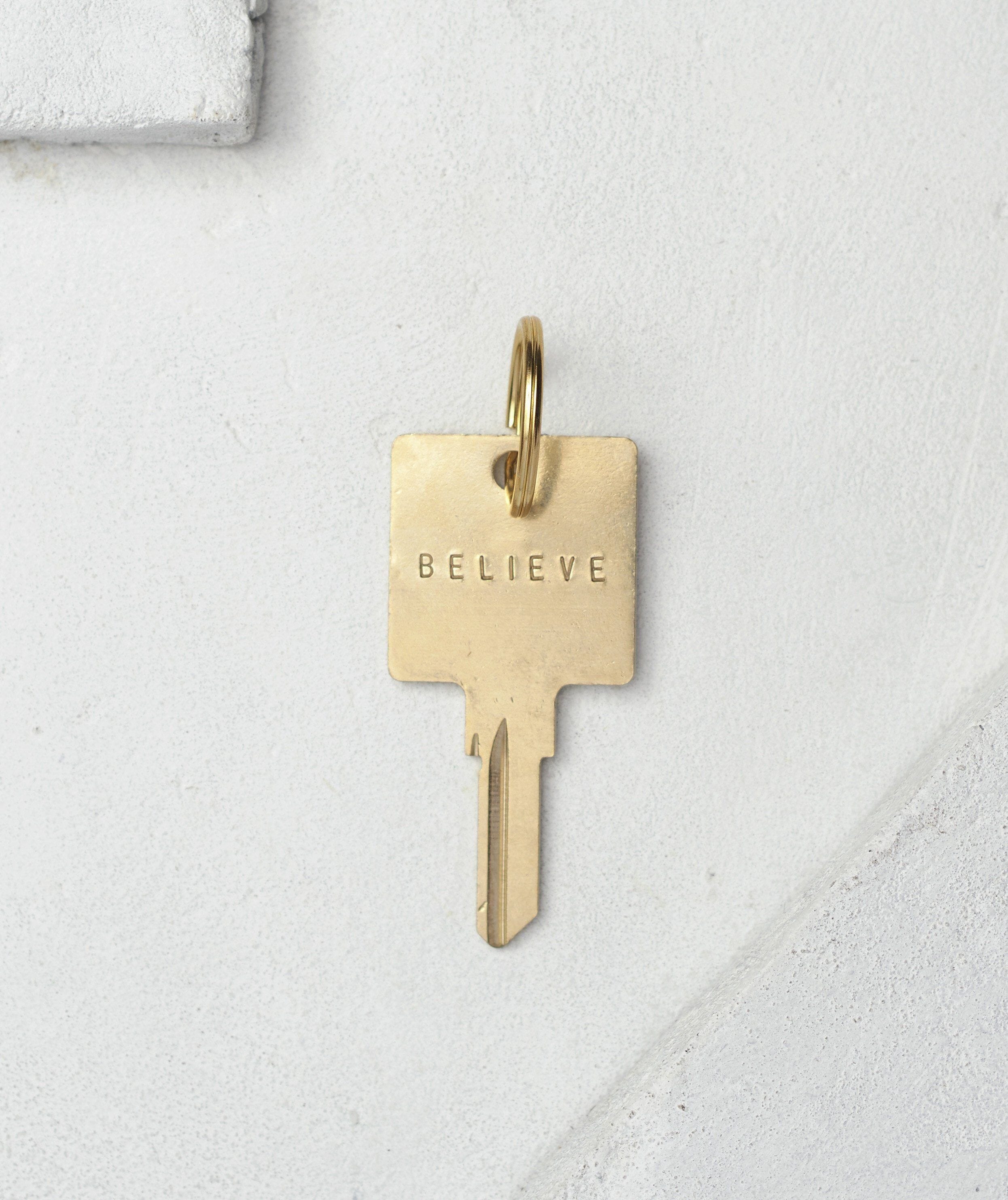 Original Keychain with Custom Hand Engraved Word | The Giving Keys