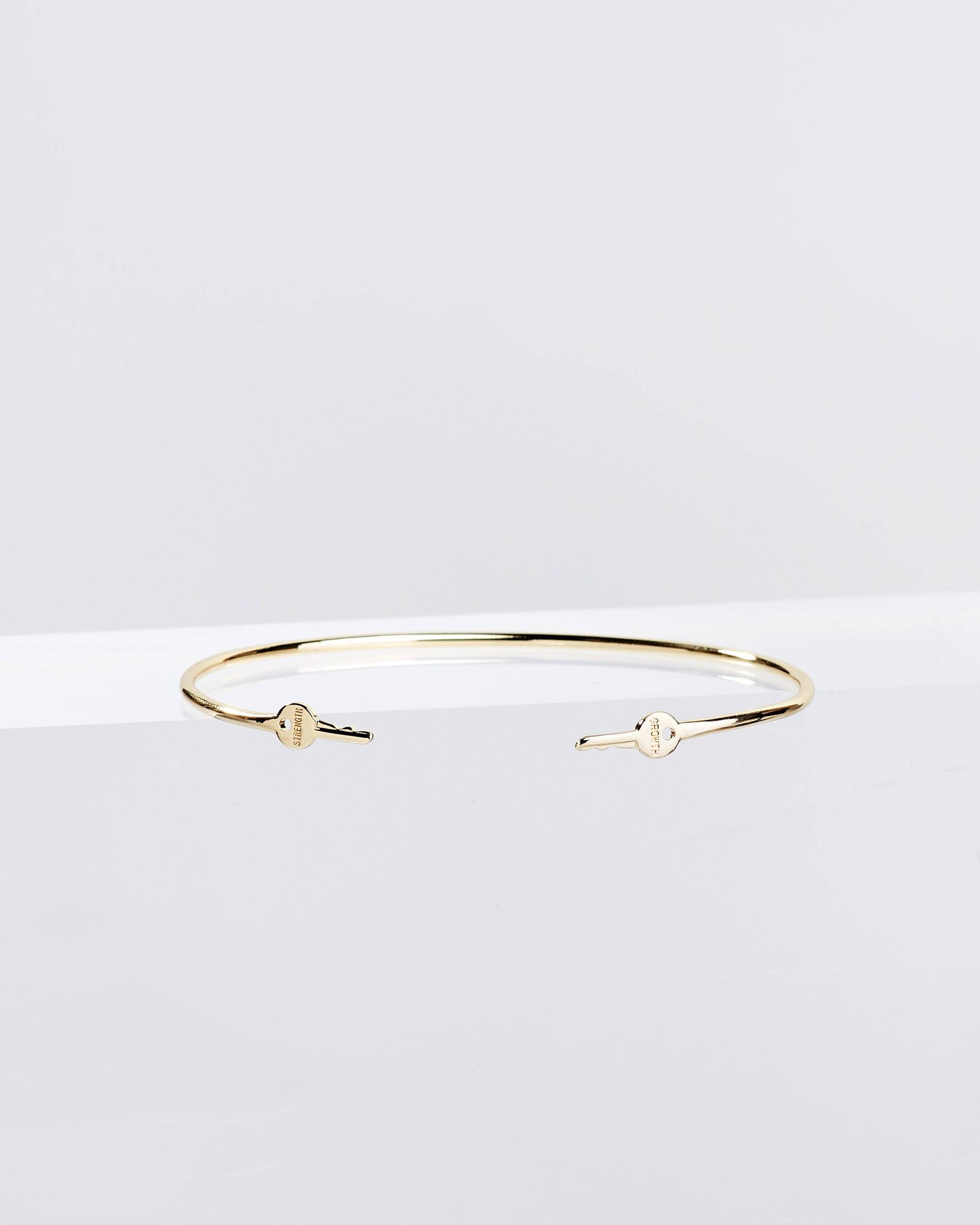 Gold Wrapped Mini Key Bangle Bracelets The Giving Keys GROWTH + STRENGTH Gold 